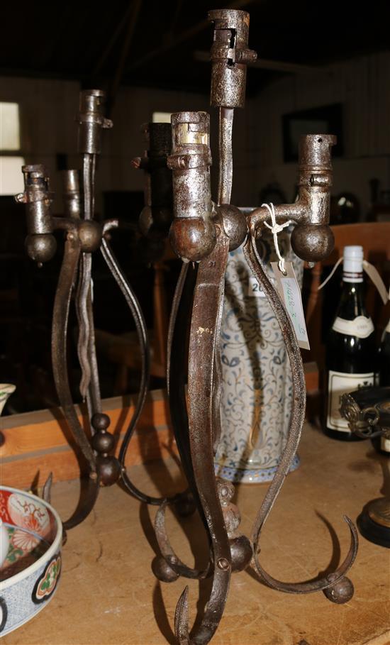 A pair of French steel bayonet candelabra